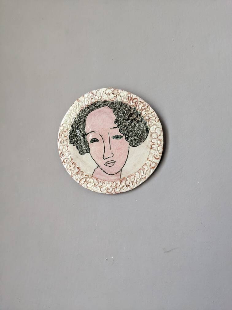 Handmade ceramic wall hanging portrait enameled medallion