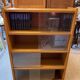Bibus 1960s bookcase light oak with sliding glass