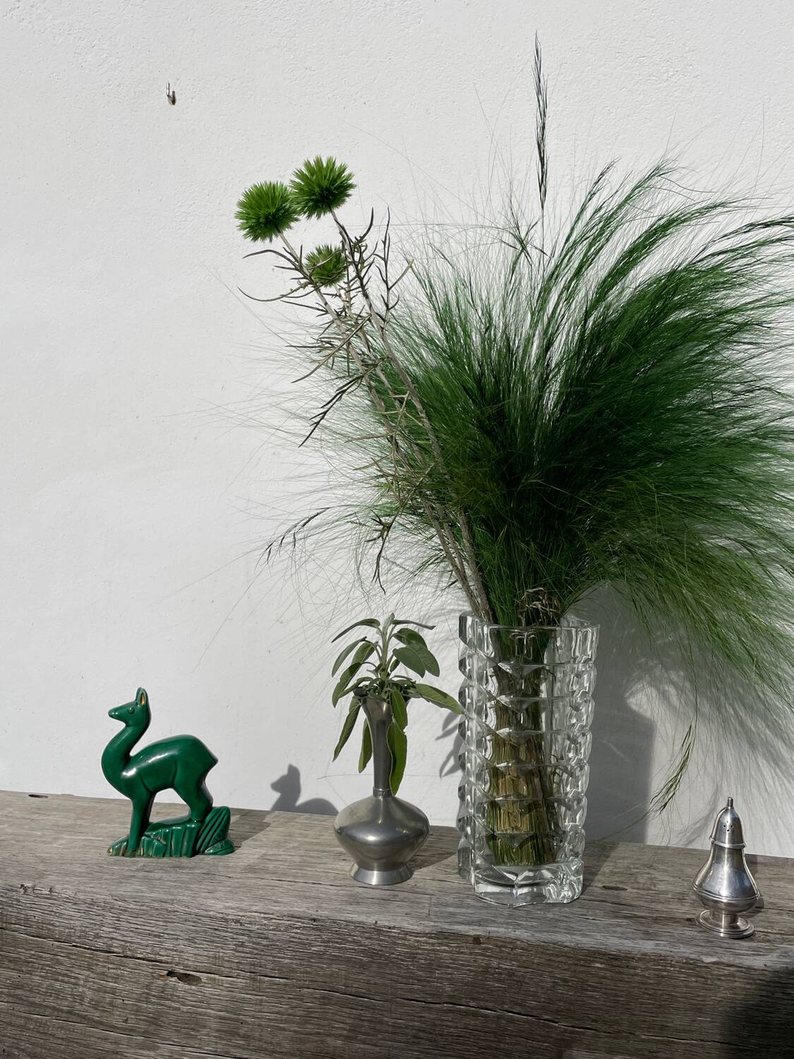 Art Deco figurine of a green ceramic doe