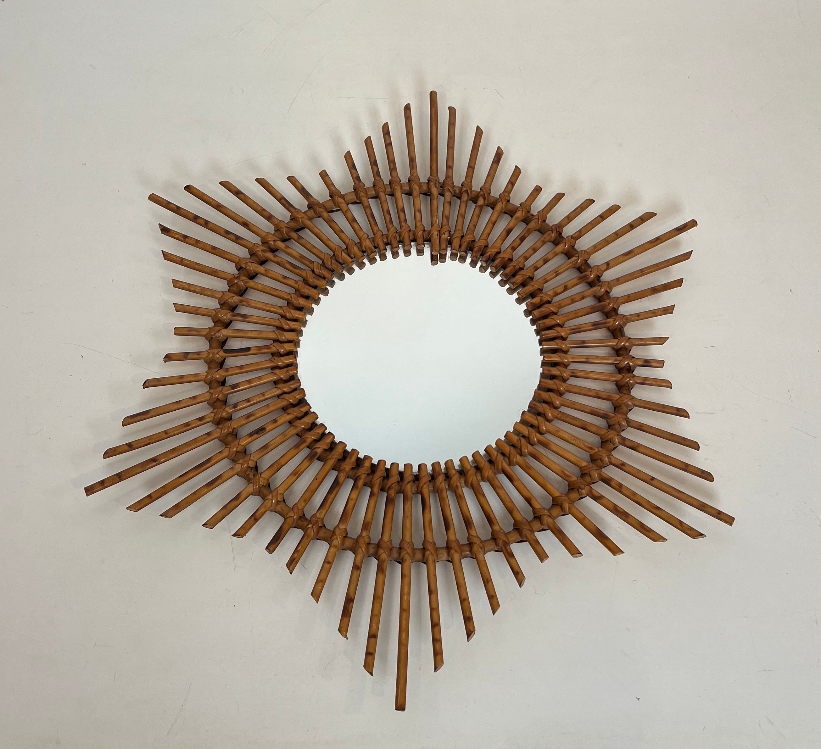 Rattan mirror in the shape of a star.