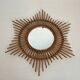 Rattan mirror in the shape of a star.