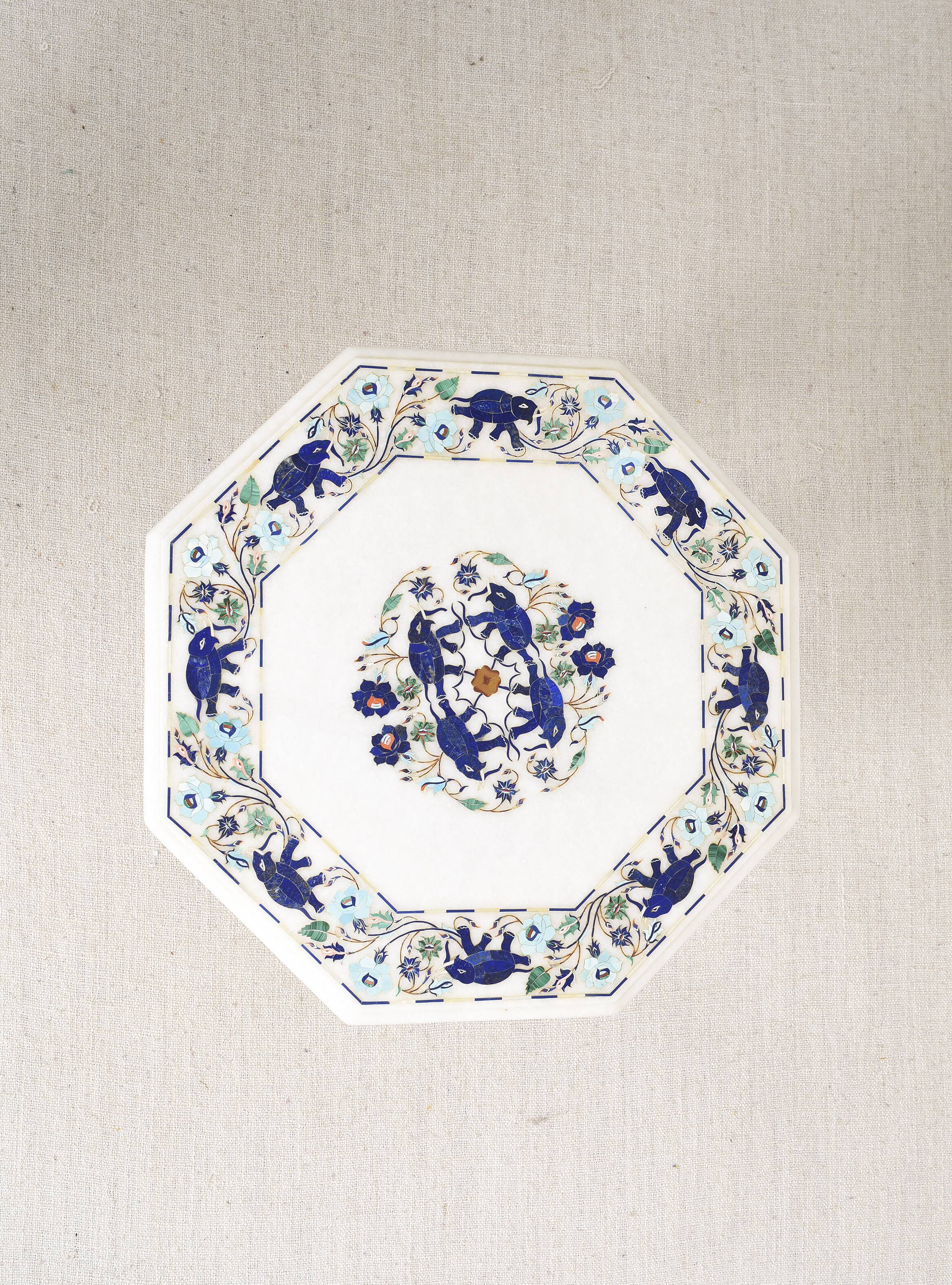 Side table with marble top and inlaid stones
