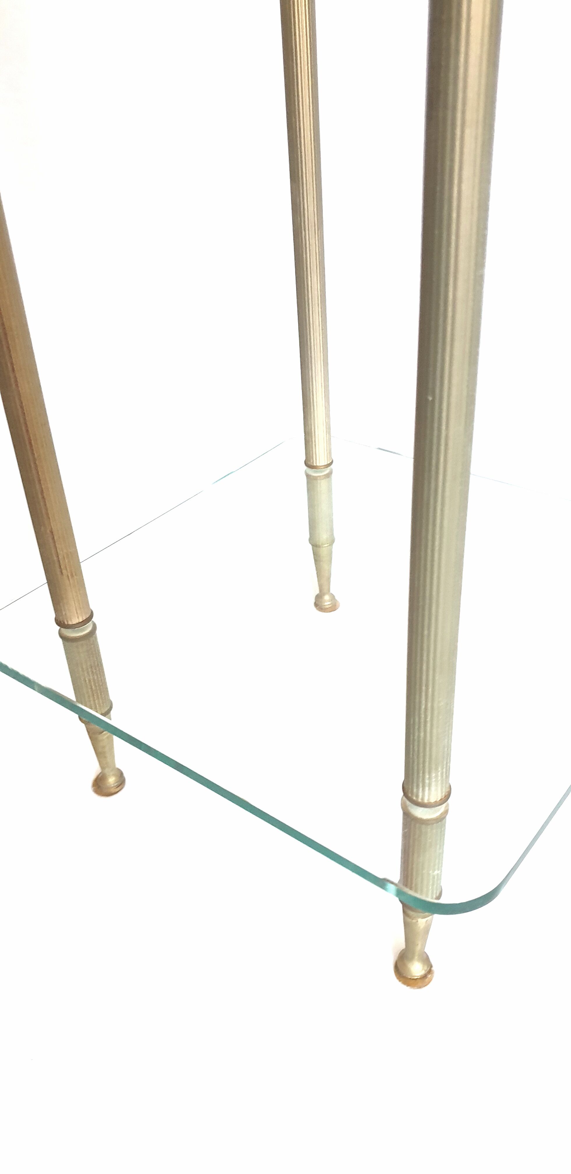 Side table in glass and brass