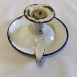 Cellar rat in old enamelled sheet metal