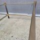 Gold glass coffee table with tobacco-colored legs, 1970s design