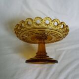 Bowl on openwork amber glass base
