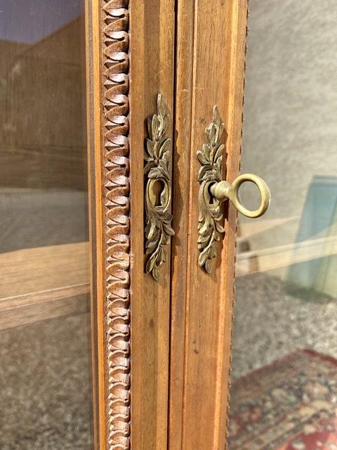 Louis XVI-style walnut library showcase