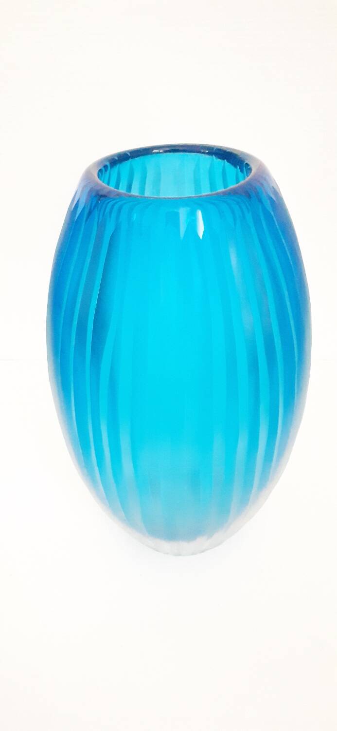 Antique turquoise glass vase