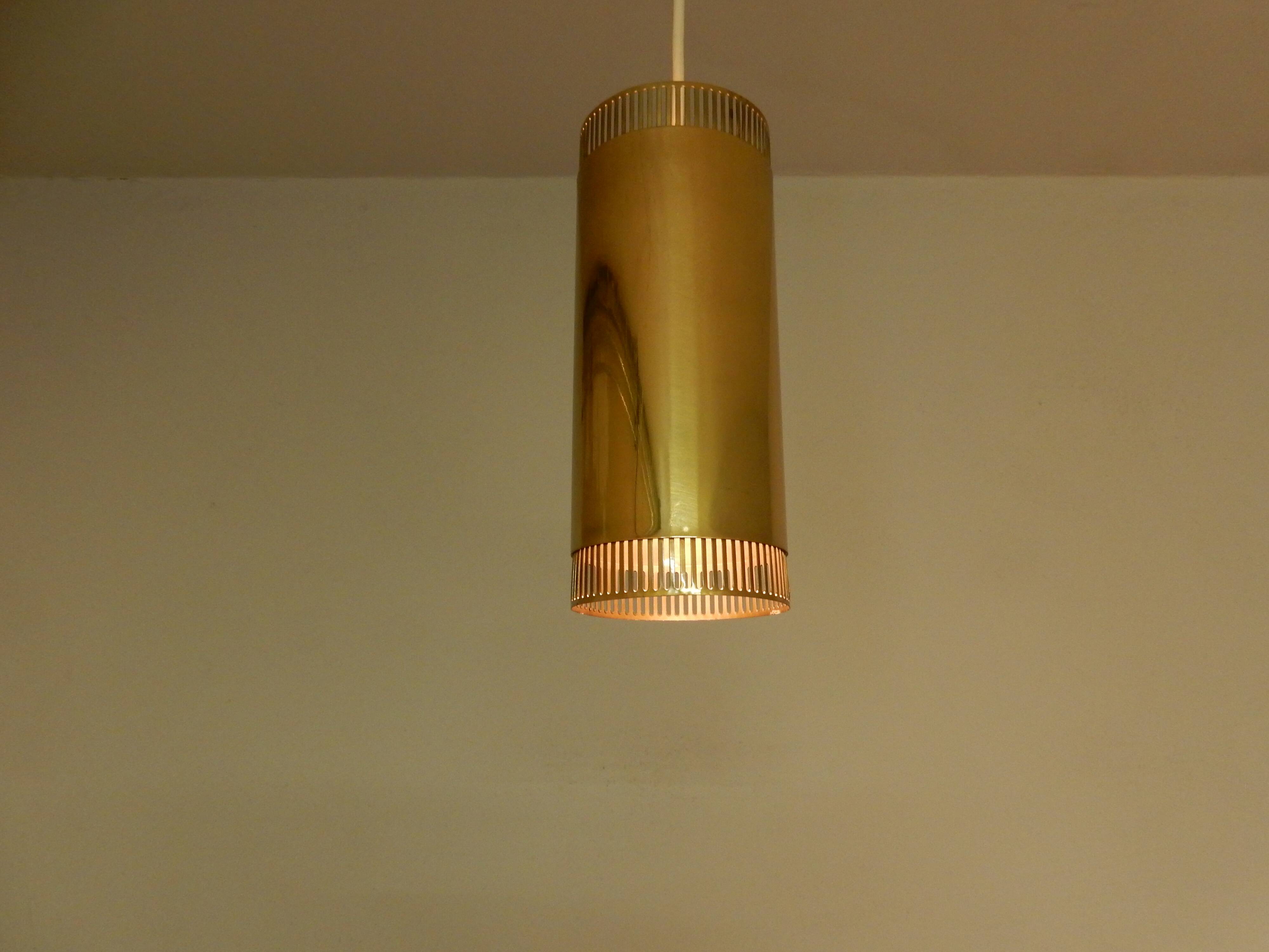 Set of 3 perforated brass cylindrical pendant lamps, Sweden 1960's