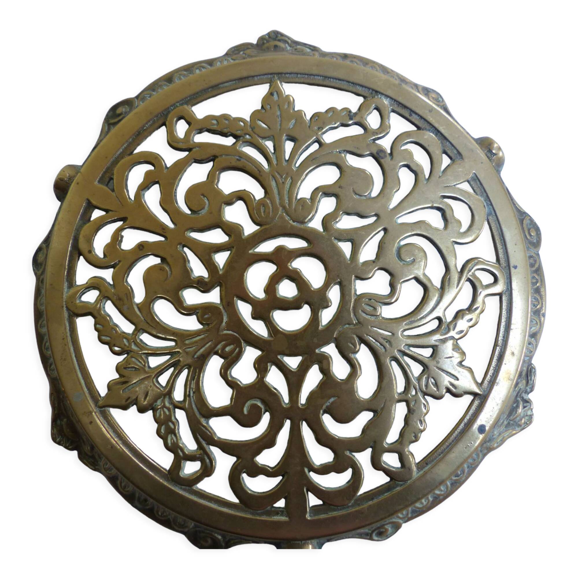 Worked copper trivet