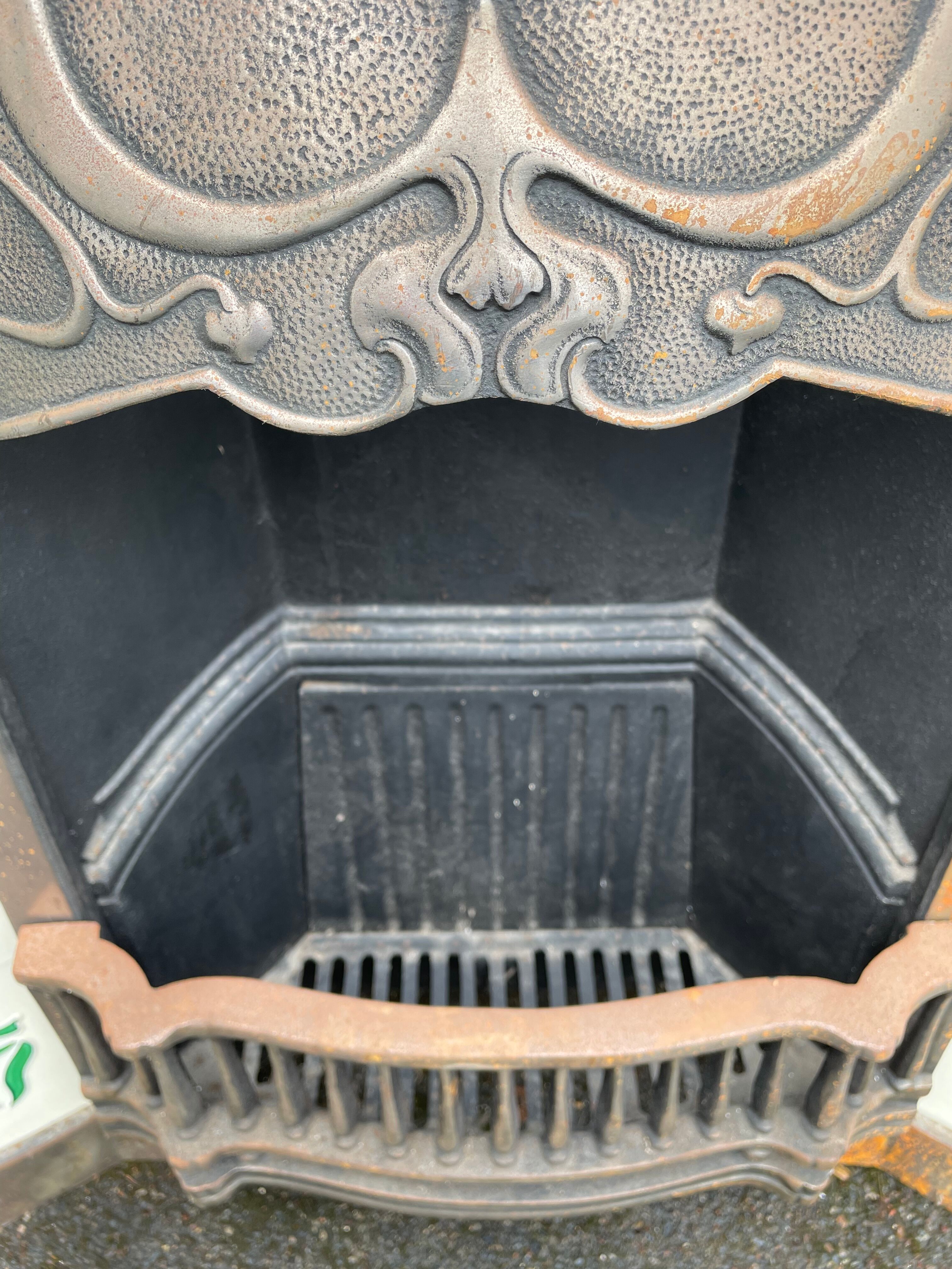 Open cast iron fireplace, Art Nouveau style