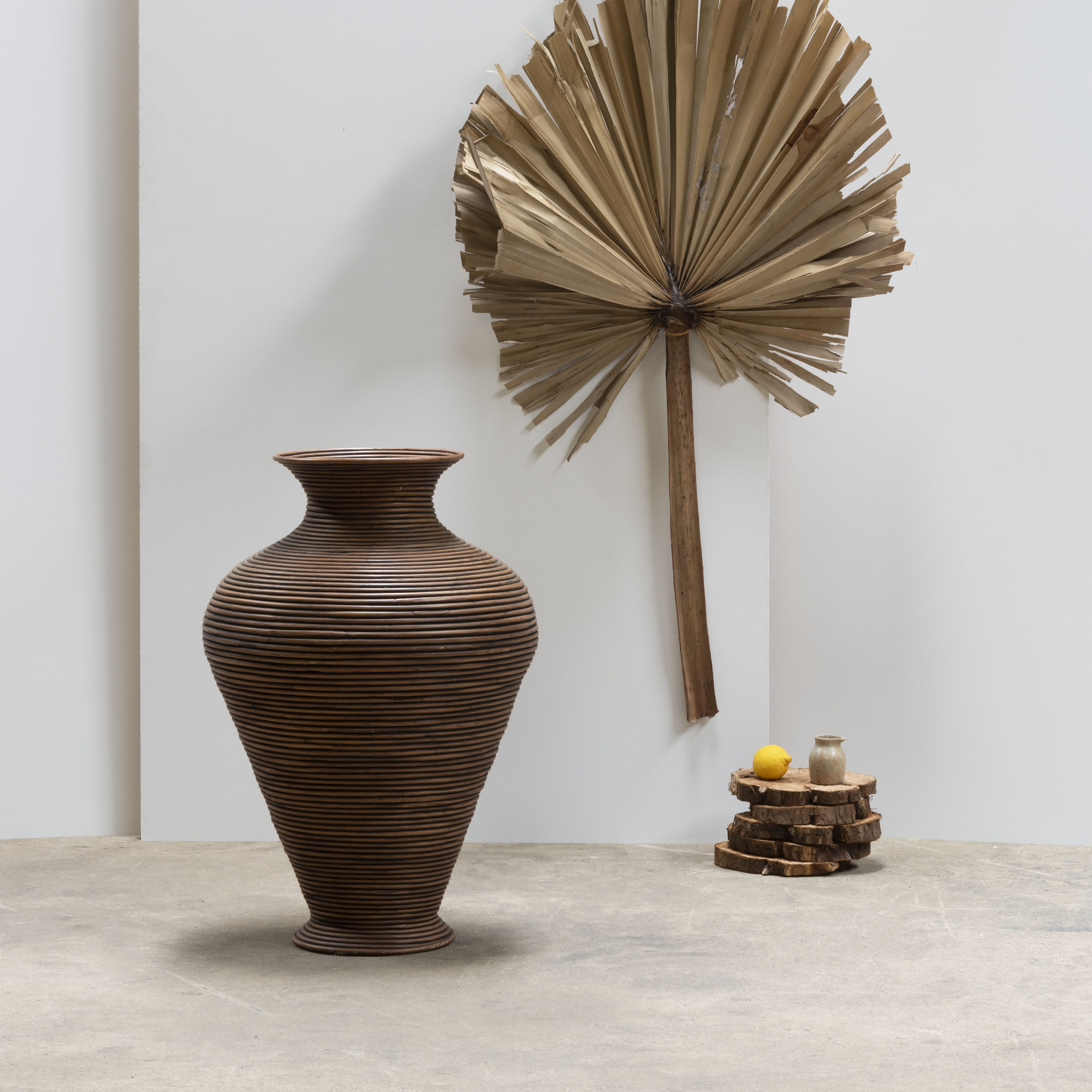 Curved rattan floor vase, Italy 1970.