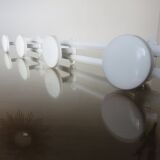 White metal coat holder in 70s