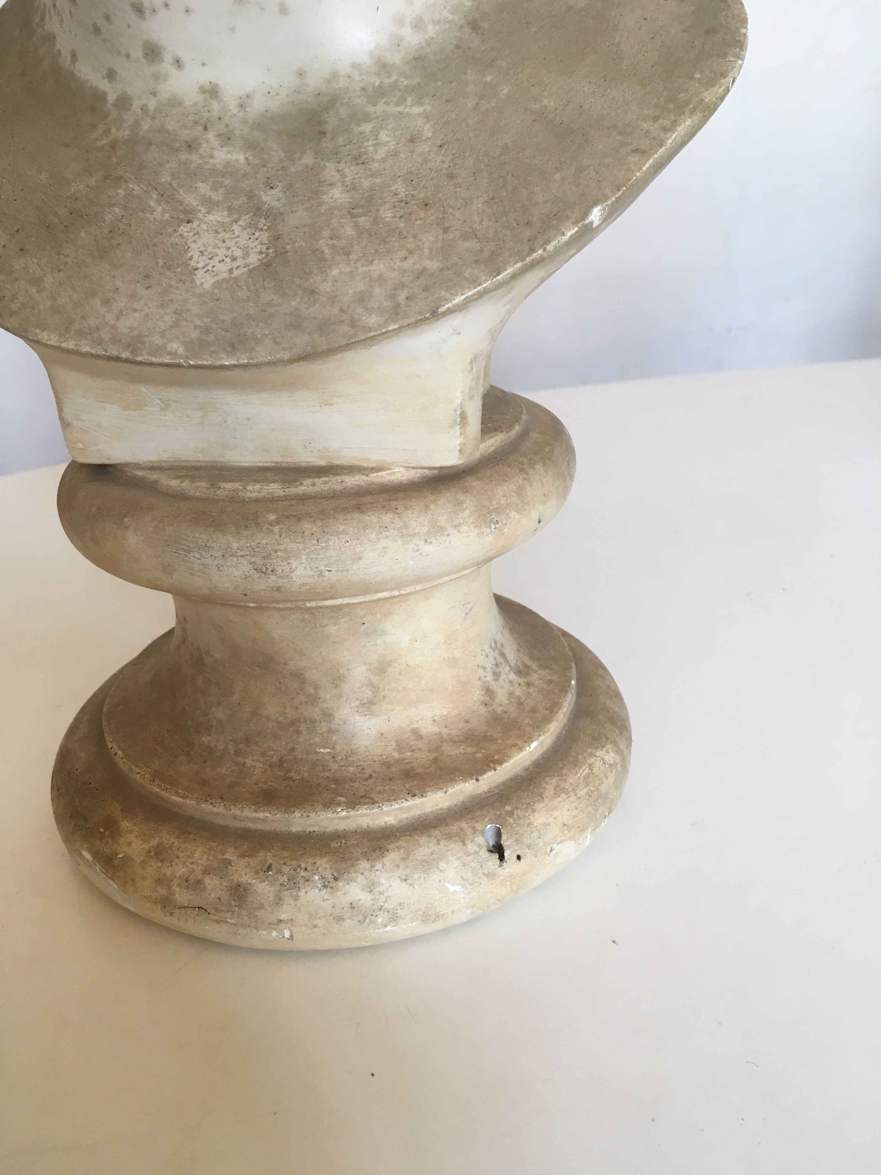 Former girl bust end 19th in plaster cast on its base