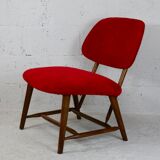 Chauffeuse by Alf Svensson, Model TeVe, published by Ljungs Industrier, Sweden, 1953. Retyped red.