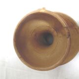 Candlestick in sandstone, cellar rat