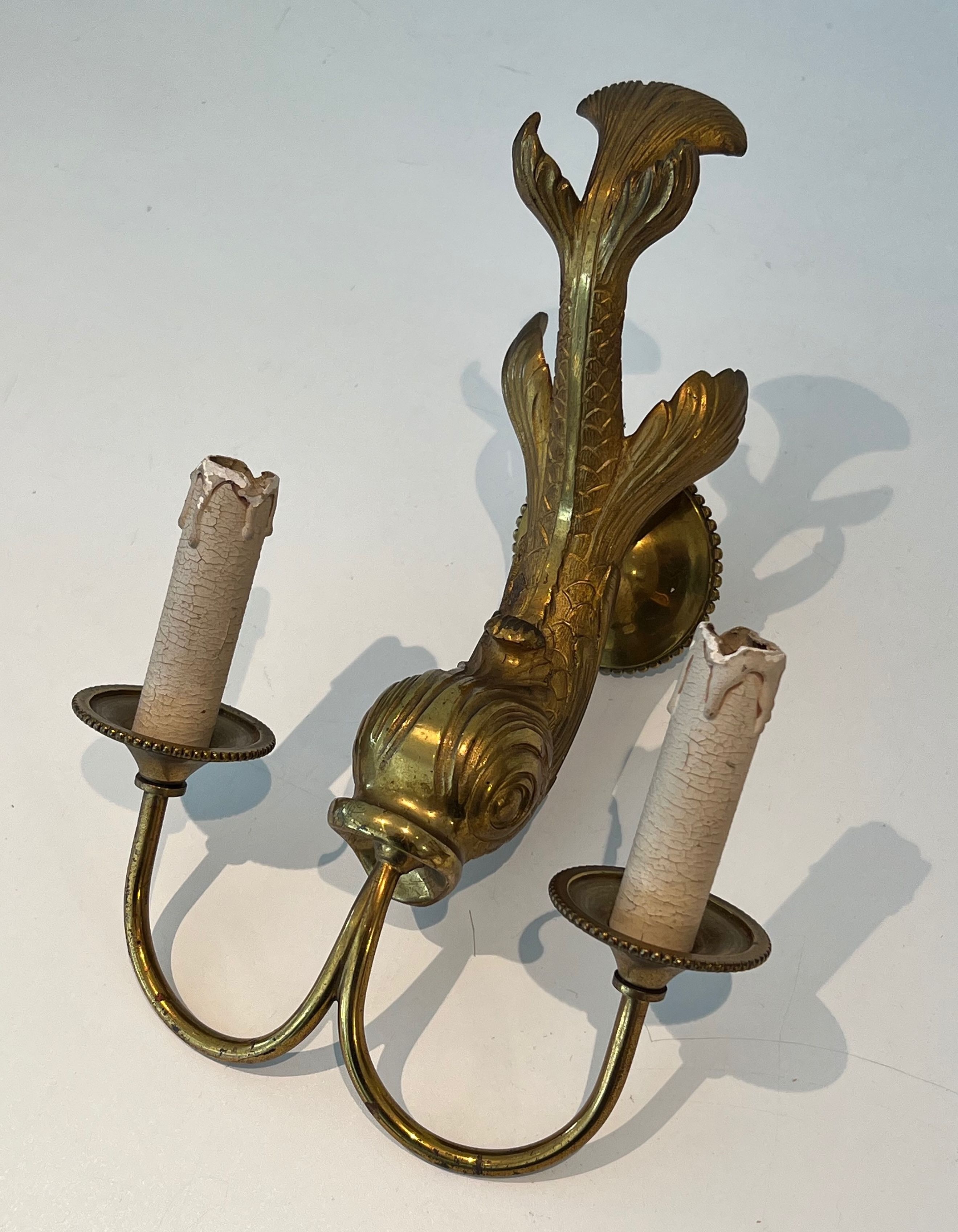 Pair of bronze wall sconces with dolphins by Maison Jansen