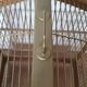 Wooden and gilded metal birdcage