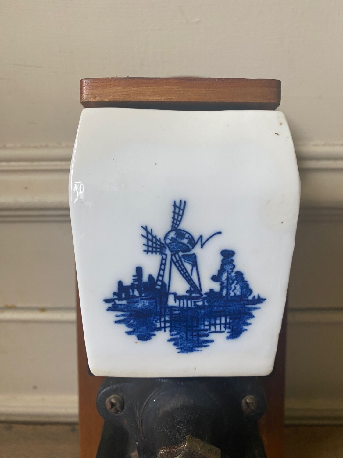 Old wall-mounted coffee grinder