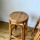 Pair of wicker bar stools and bamboo cane