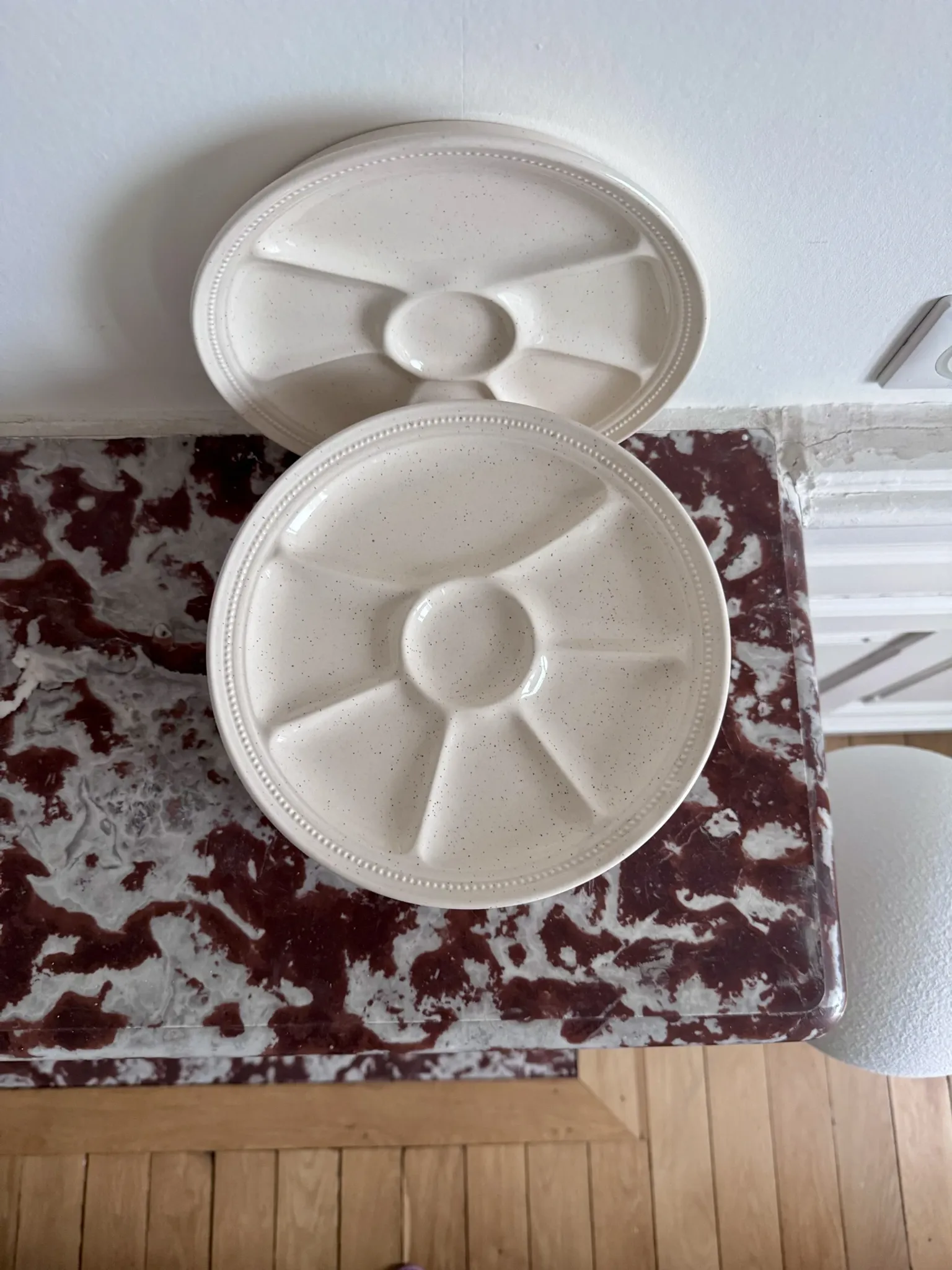 The earthenware fondue plates from Haute-Provence.