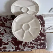 The earthenware fondue plates from Haute-Provence.