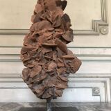 Sandy rose with a base