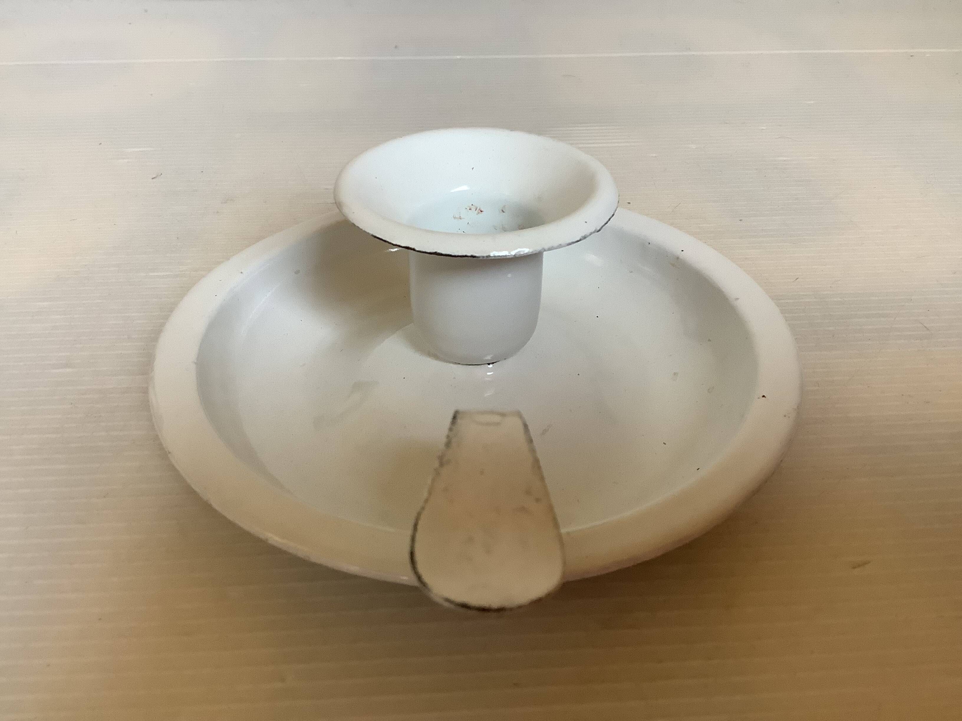 Cave rat candle holder in enamelled sheet metal