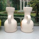 Old vinegar and oil maker with vintage decoration floral motifs