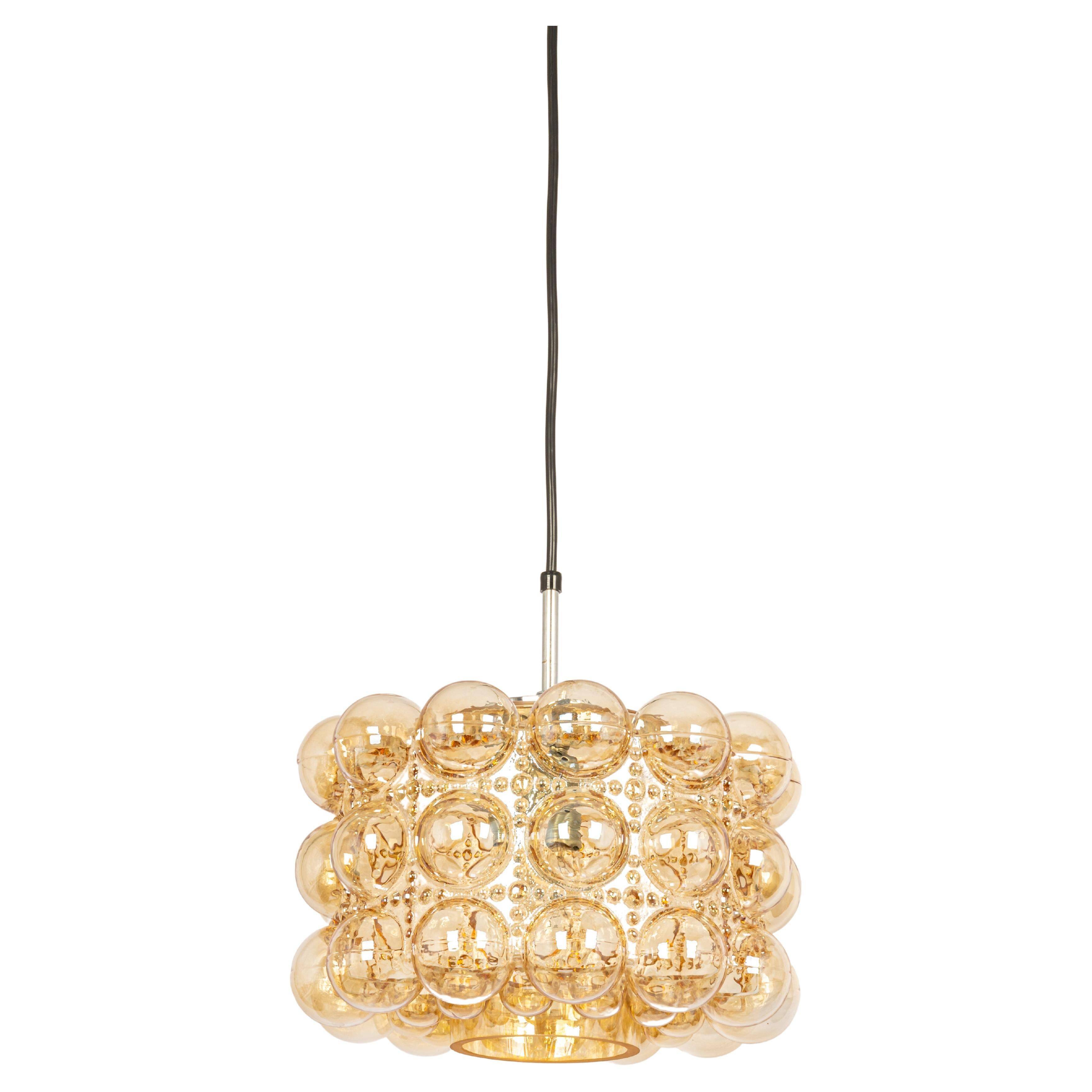 Large amber bubble glass pendant light by Helena Tynell for Limburg, Germany, 1970s.