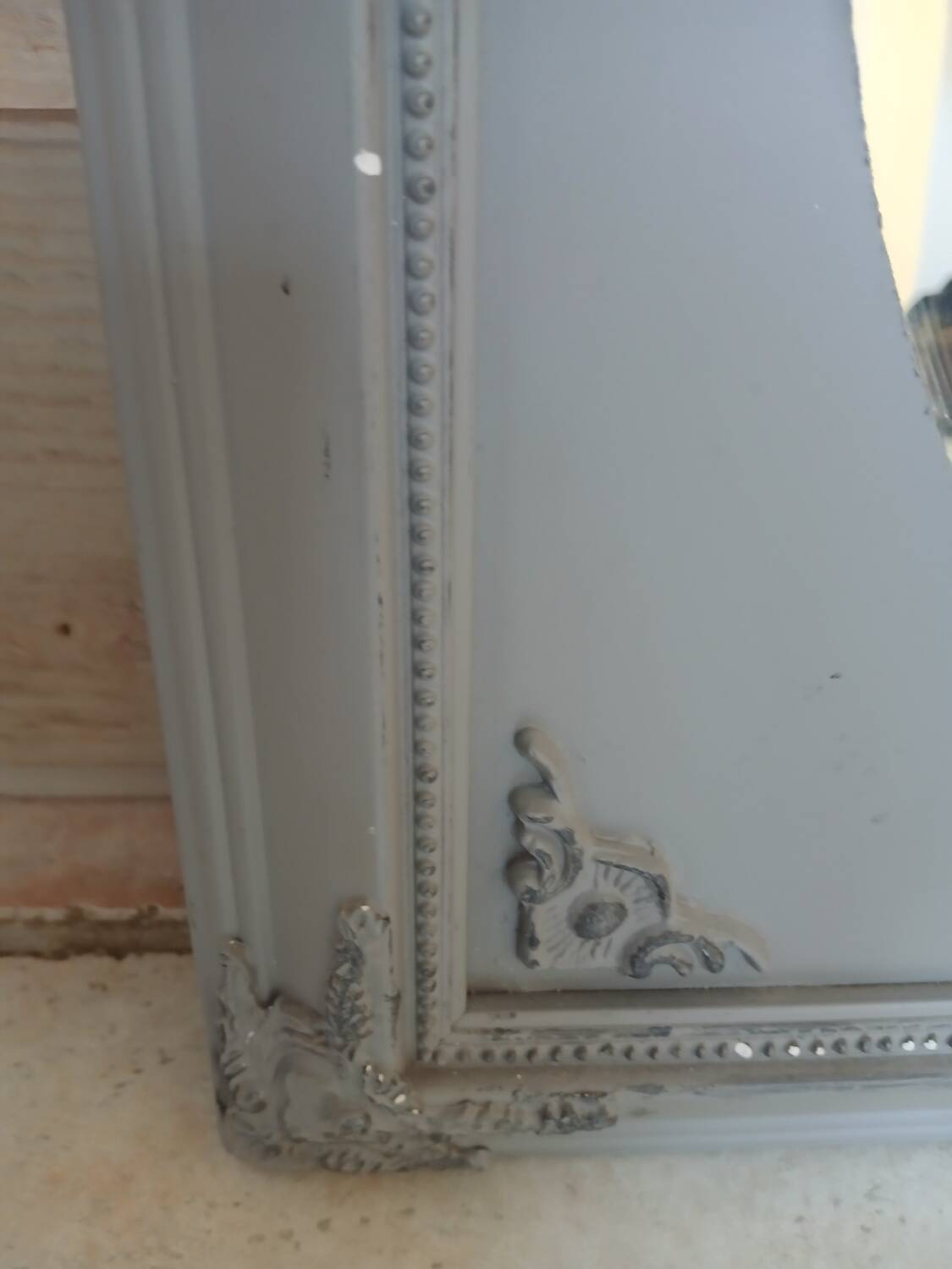 Mirror with a grey wooden frame