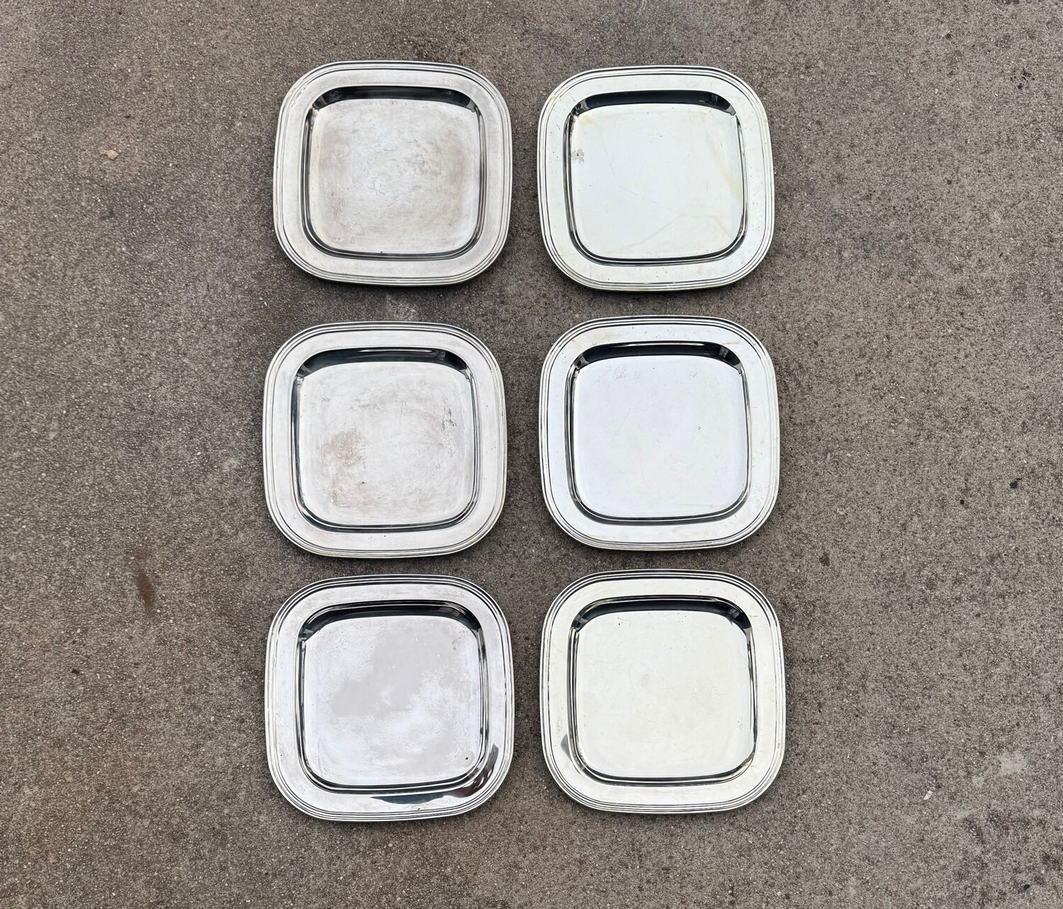 Silver-plated metal underplates from the 1980s.