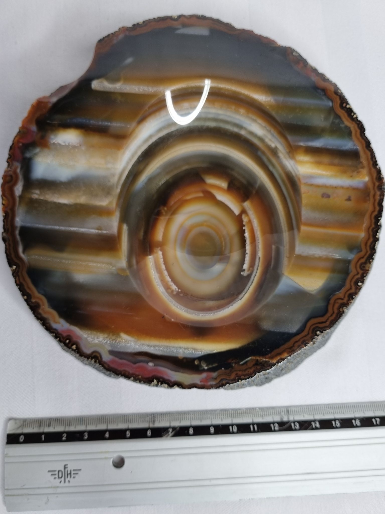 Empty pocket, slice of brown ochre agate