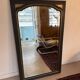 Miroir vintage glace biseautée en bois noir et doré