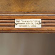 Shannon File Co drum desk in Victorian walnut with certificate.