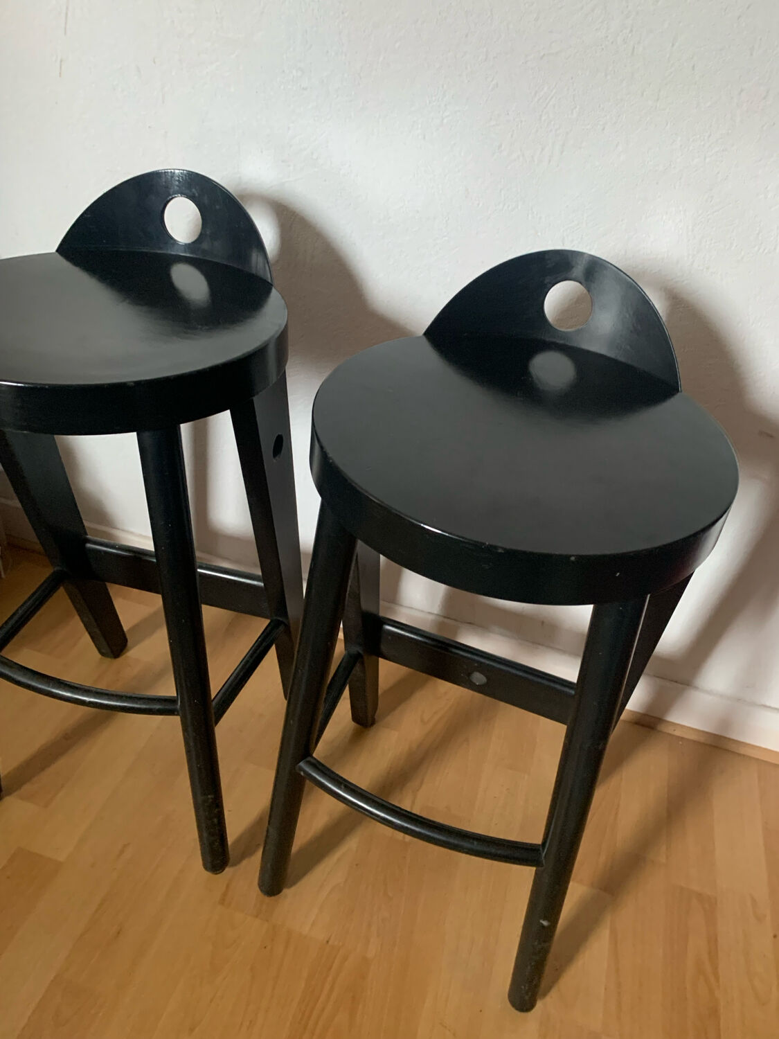 Pair of black designer stools by Baumann