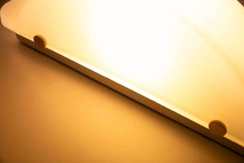 Space Age glass wall lamp by Peil & Putzler, minimalist.