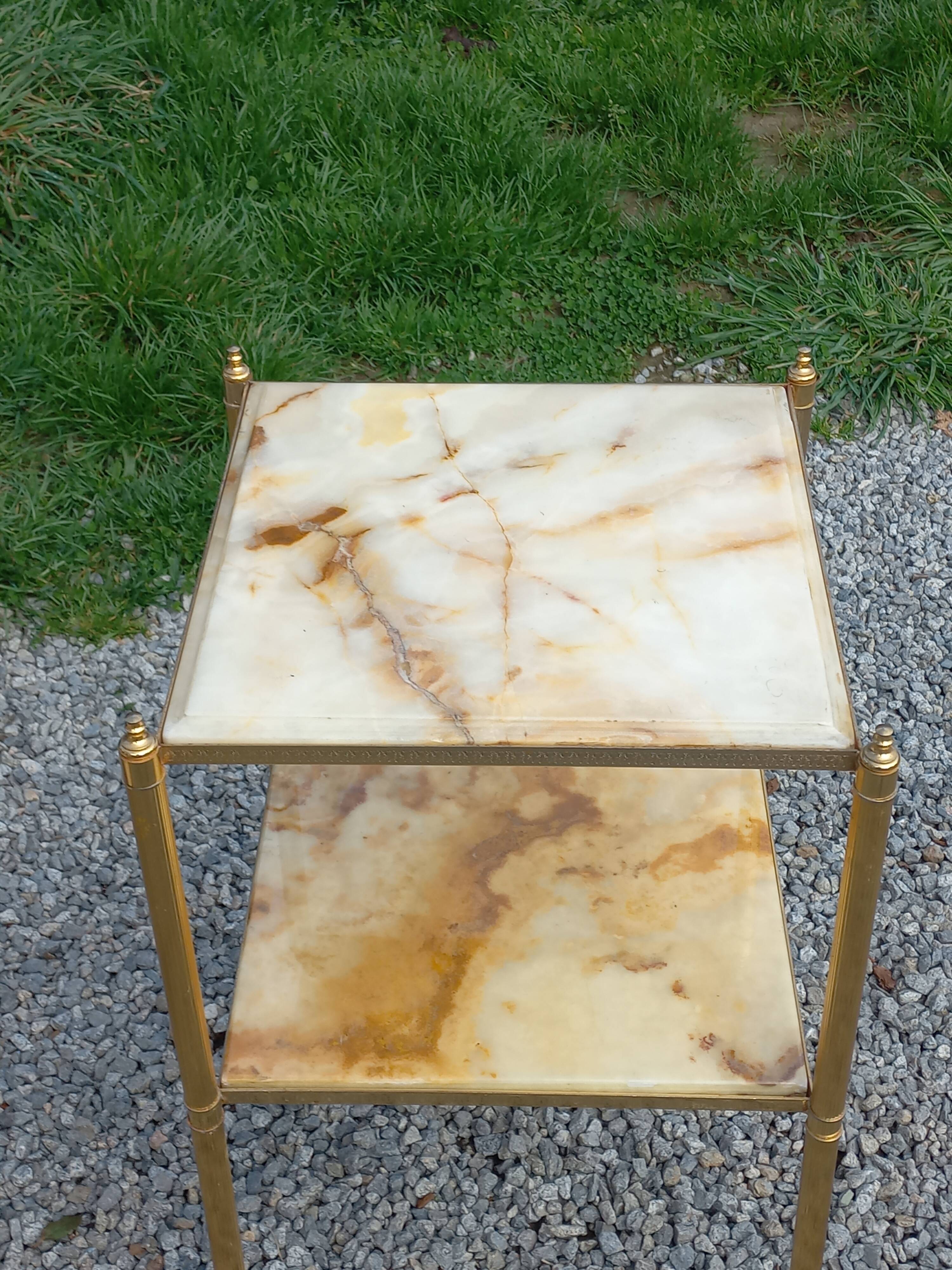 Pair of neoclassical side tables in bronze, brass, marble, and o.