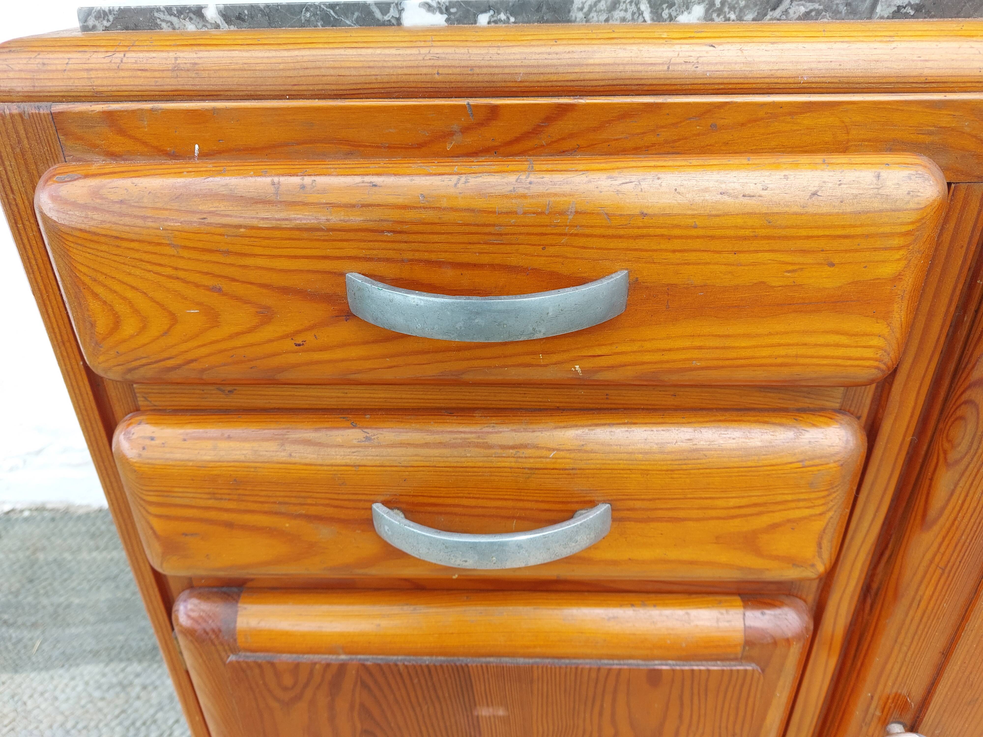 Mado buffet, marble top and asymmetrical doors.