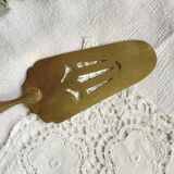 Pie server cake dessert in gold metal vintage silverware yellow bakelite handle