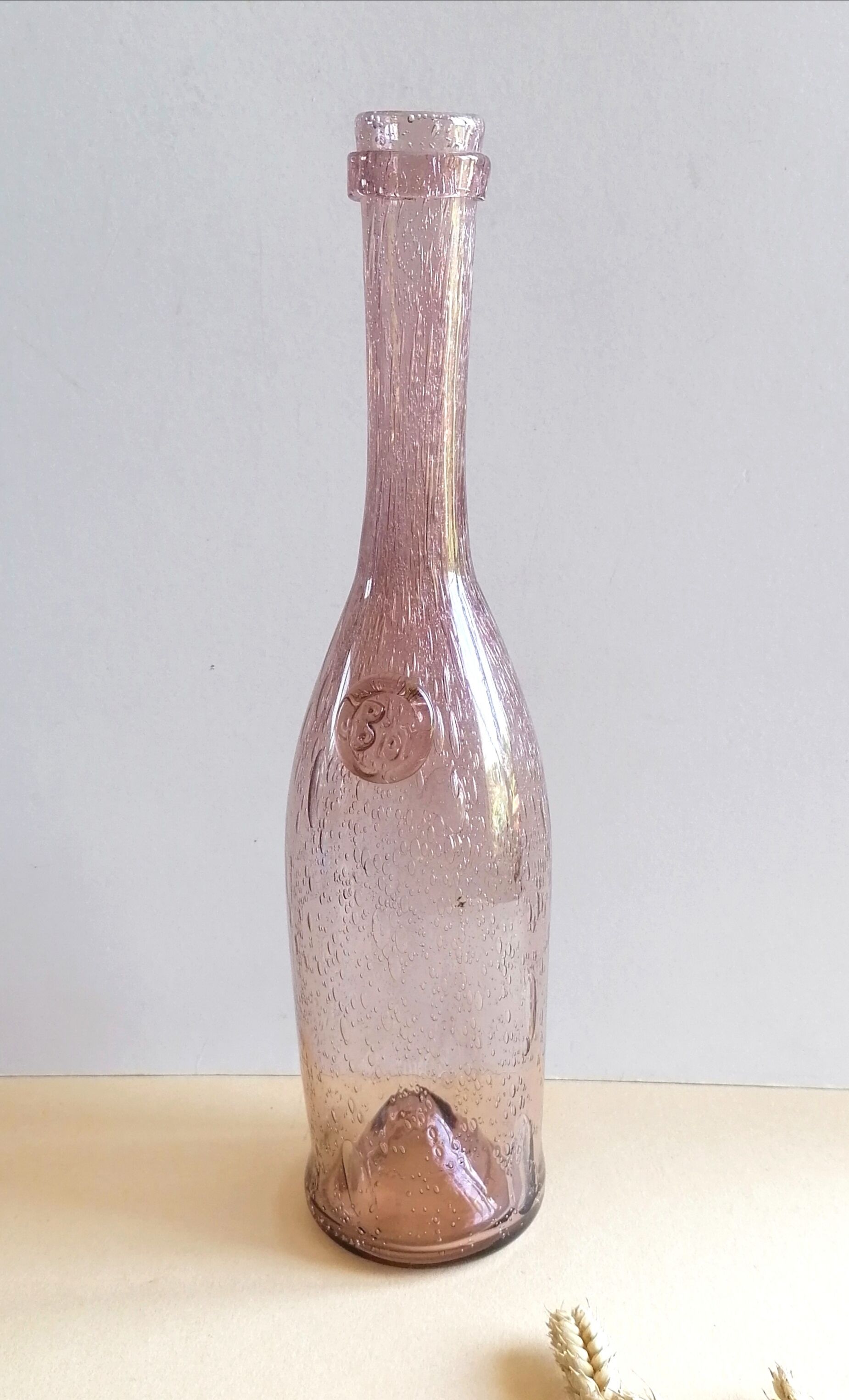 Biot bubble glass bottle