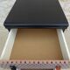 Vintage commode on wheels with three drawers in faux leather and fabric - end.