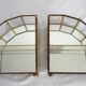 Pair of gilded brass, glass, mirror display cases from the 60s
