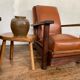 PAIR OF BRUTALIST ARMCHAIRS IN TEAK AND VINTAGE COGNAC LEATHER FROM THE 1950S