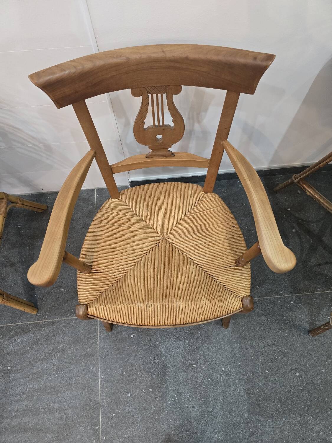 Pair of antique lyre-shaped armchairs – woven straw seats