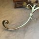 Coat rack, double hook in bronze from the 19th century.