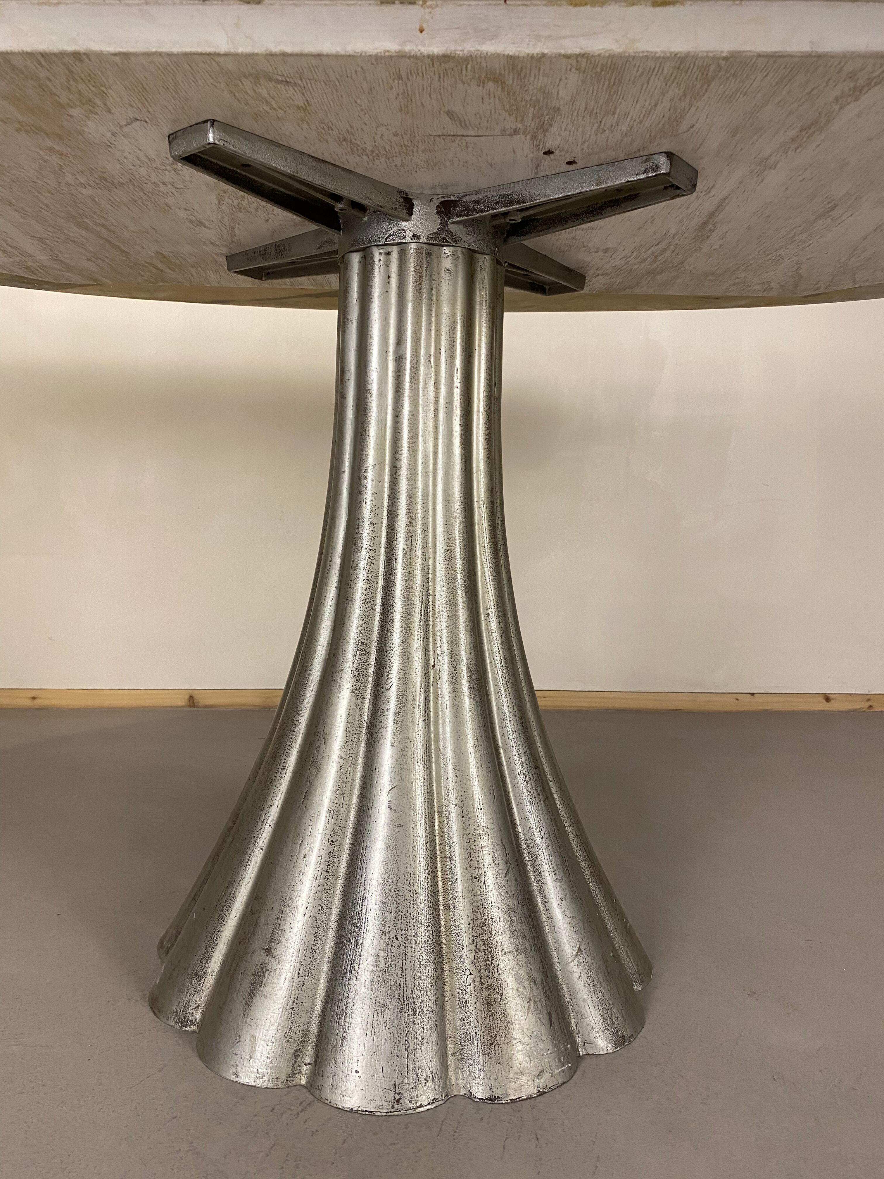 Oval marble dining table with iron base