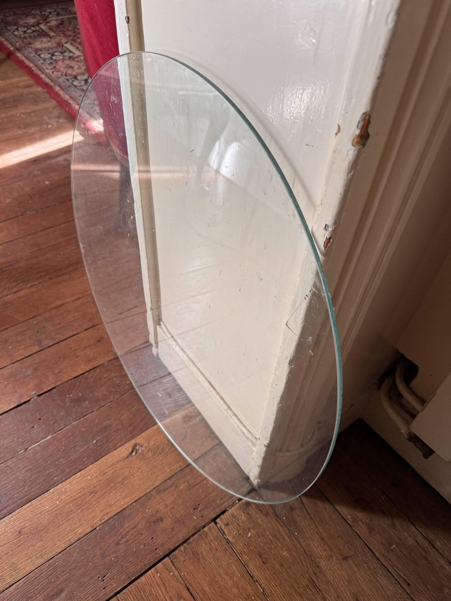 Round coffee table in Louis XV style, with sun cane and glass top.