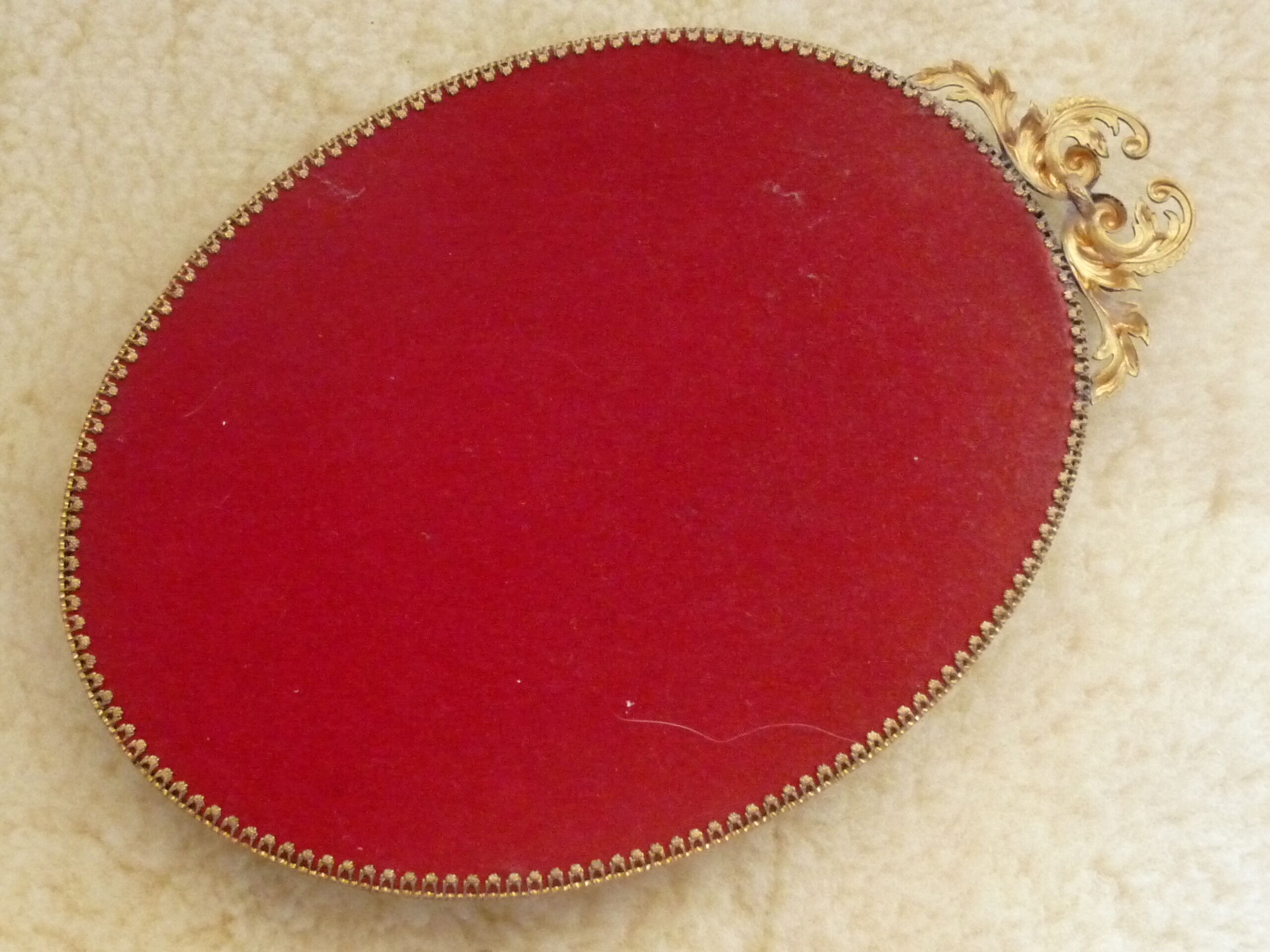 Vintage gilded brass witch's curved mirror - 27x19cm