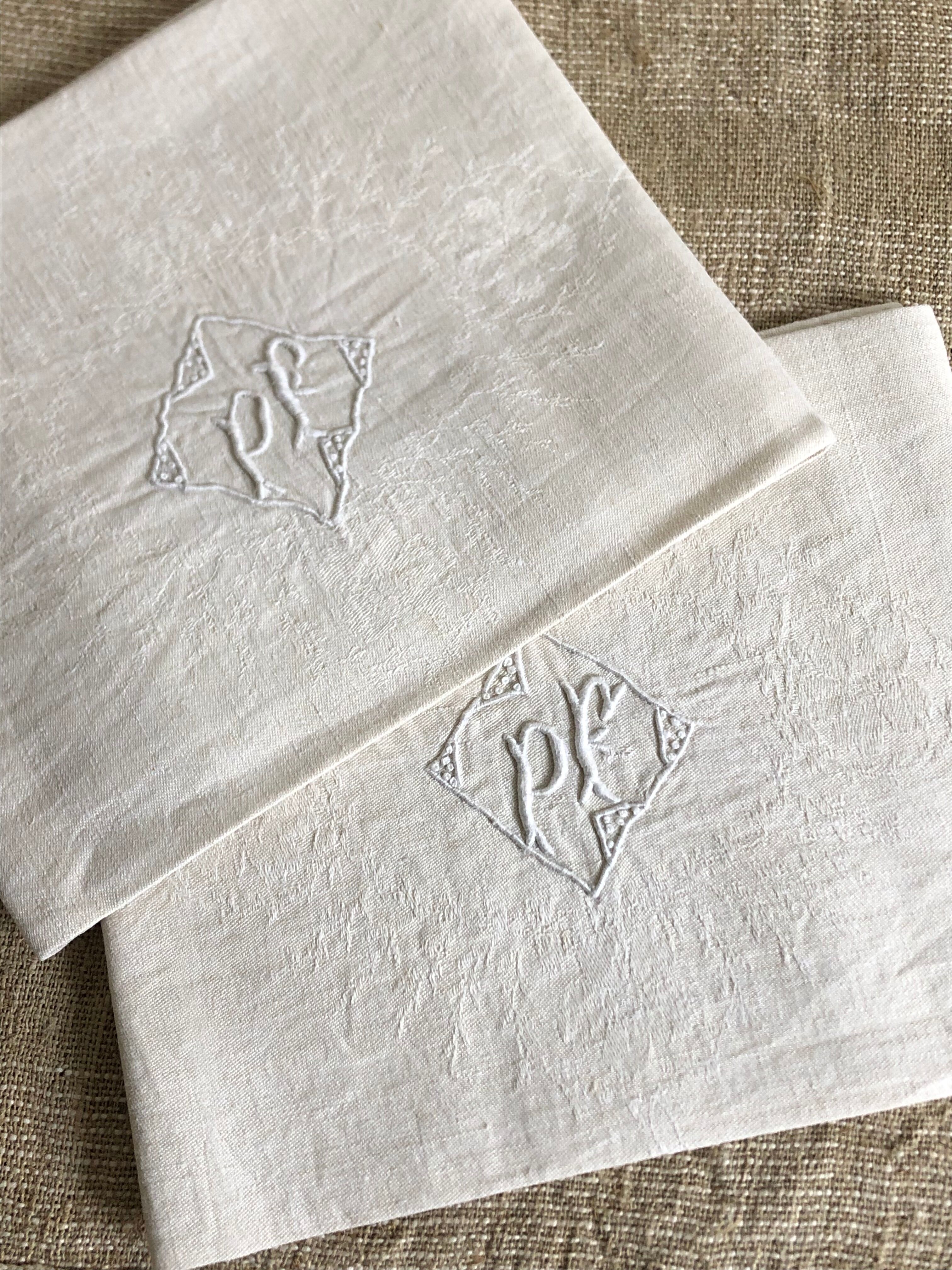 Pair of damask table napkins, monogram
